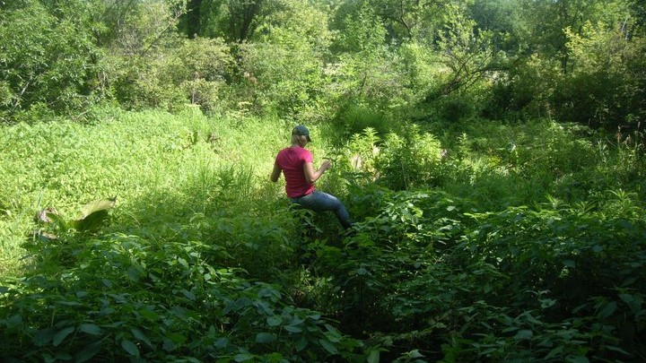 Anna Funk out in a fen during a field survey.